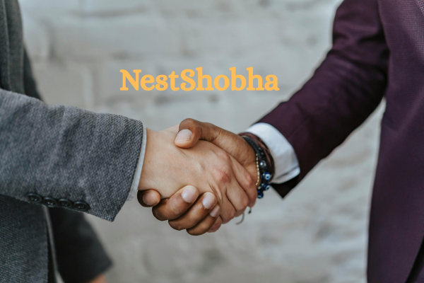 Team members at NestShobha working together in a modern studio space